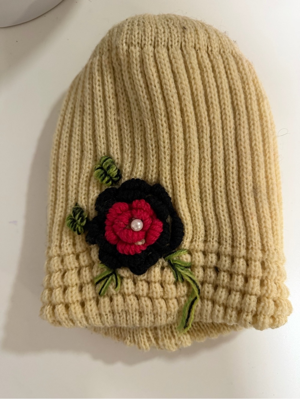 Cream Knit Beanie with Red & Black Flower